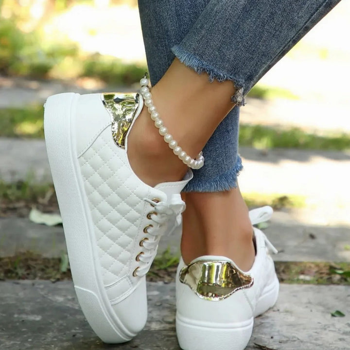 Damen Gesteppte Schnürsneaker mit Golddetails Flache Plateau-Sohle