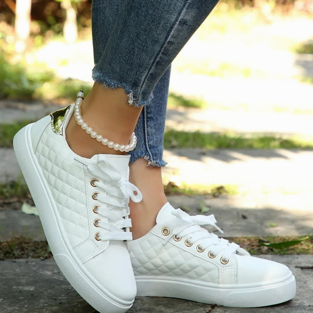 Damen Gesteppte Schnürsneaker mit Golddetails Flache Plateau-Sohle